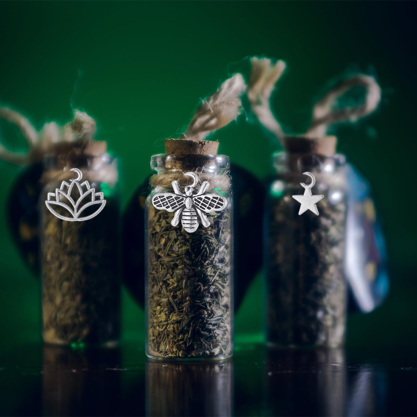 LemonRoad 24 Pcs Spell Jars for Witchcraft Small Tiny Glass Spell Potion Bottles with Cork and 24 Pendants Witchcraft Supplies Gifts Wishing Bottles with Rope for DIY Crafts