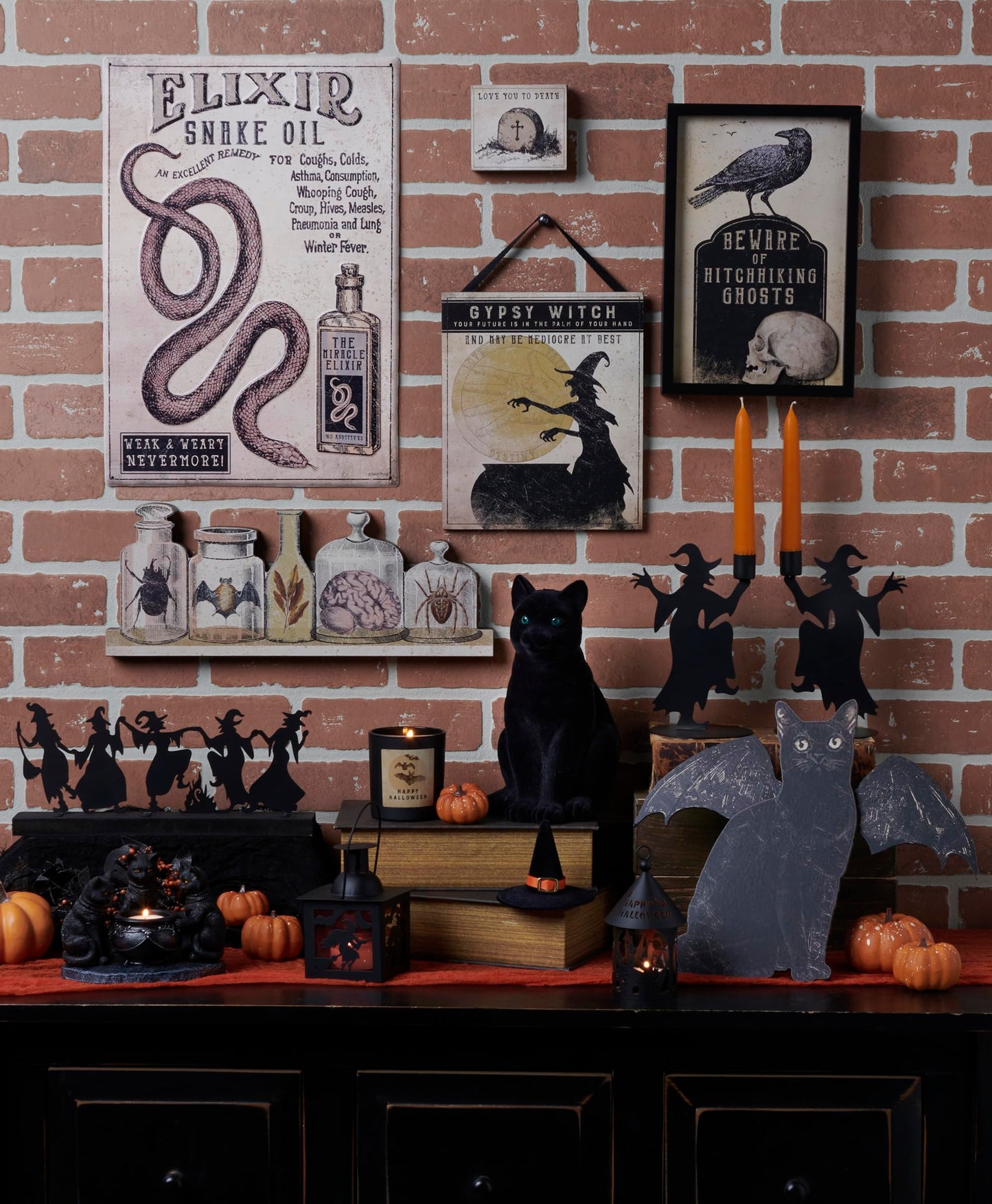 Primitives by Kathy Sitter - Dancing Witches Decorative Sitter from Our Halloween Collection Featuring a Black Metal Cutout of Witches Dancing Around a fire Attached to a Coordinating Black Wood Base