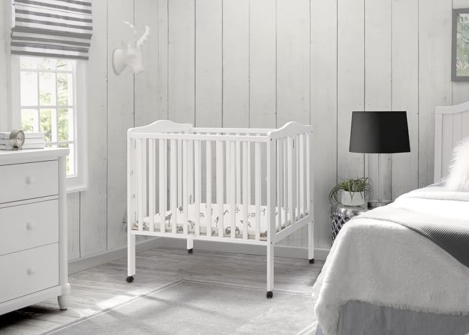 Delta Children Folding Portable Mini Baby Crib