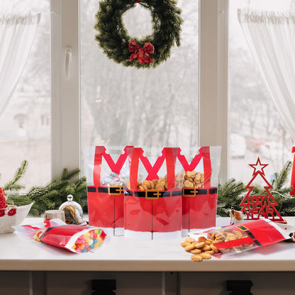 Shemilly 60pcs Christmas Treat Bags,Christmas Plastic Resealable Candy Gift Bag with Handle,Transparent Santa Pants Sealing Goodie Pouch for Xmas Winter Holiday Party Favors Decorations,9X6inch