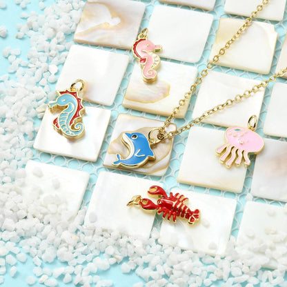 Stiesy Ocean Animal Theme Enamel Charms 5Pcs Brass Jellyfish Lobster Dolphin Sea Horse Marine Life Pendants 18K Gold Plated with Jump Rings for Beach Jewelry Making Sea Inspired Necklaces