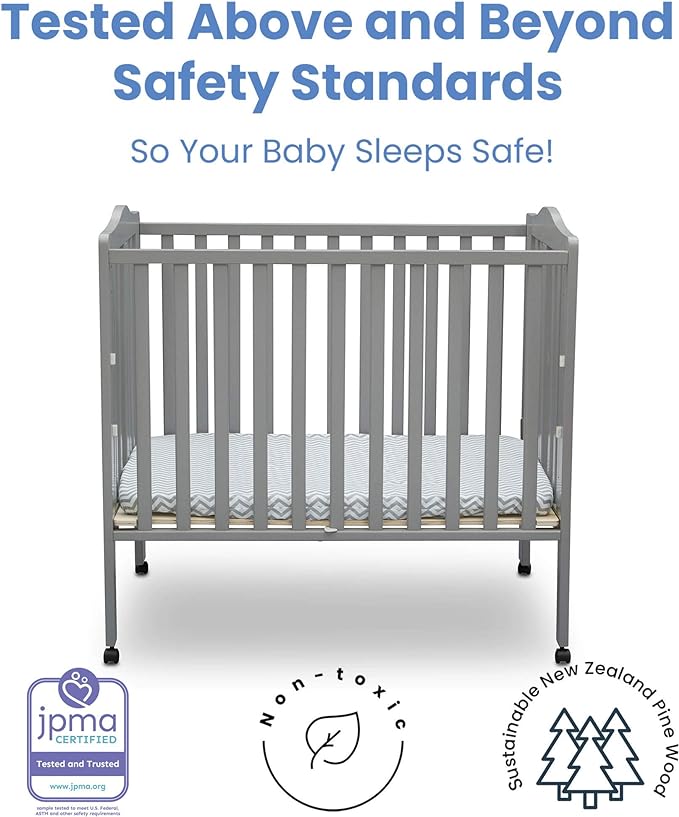 Delta Children Folding Portable Mini Baby Crib