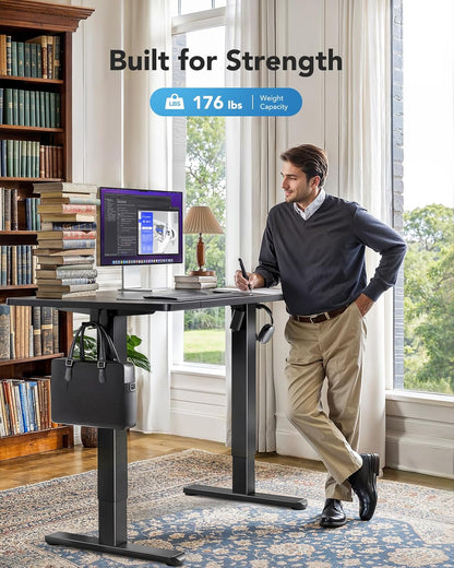 HUANUO 55 x 24 inch Electric Standing Desk, Height Adjustable Table with Headphone Hooks & Cable Manager, Sit to Stand up Desk for Home Office, Black