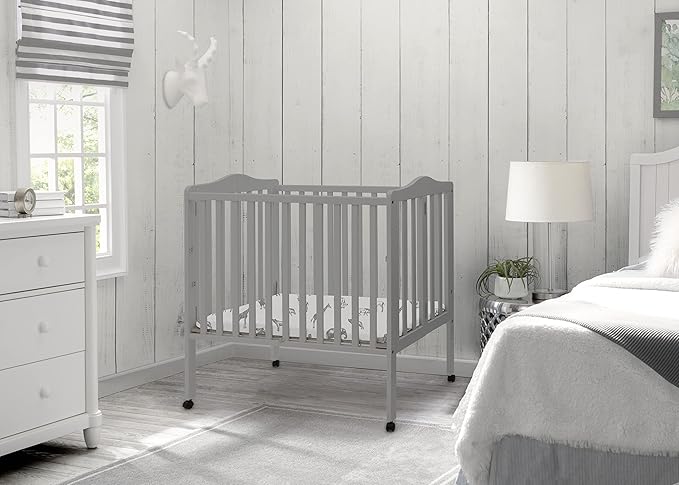 Delta Children Folding Portable Mini Baby Crib