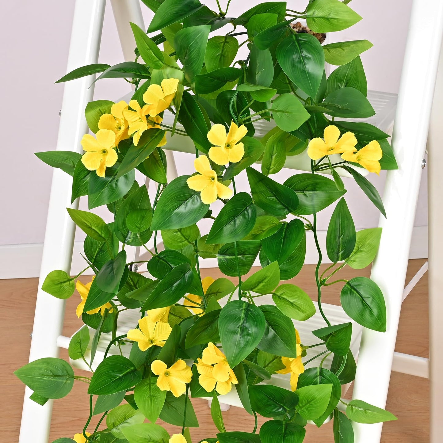 BLEUM CADE Artificial Hanging Flowers for Outdoors, 2pcs Fake Hanging Plants Pothos Vines with Yellow Flowers for Wall Home Living Room Indoor Outdoor Decor (No Baskets)