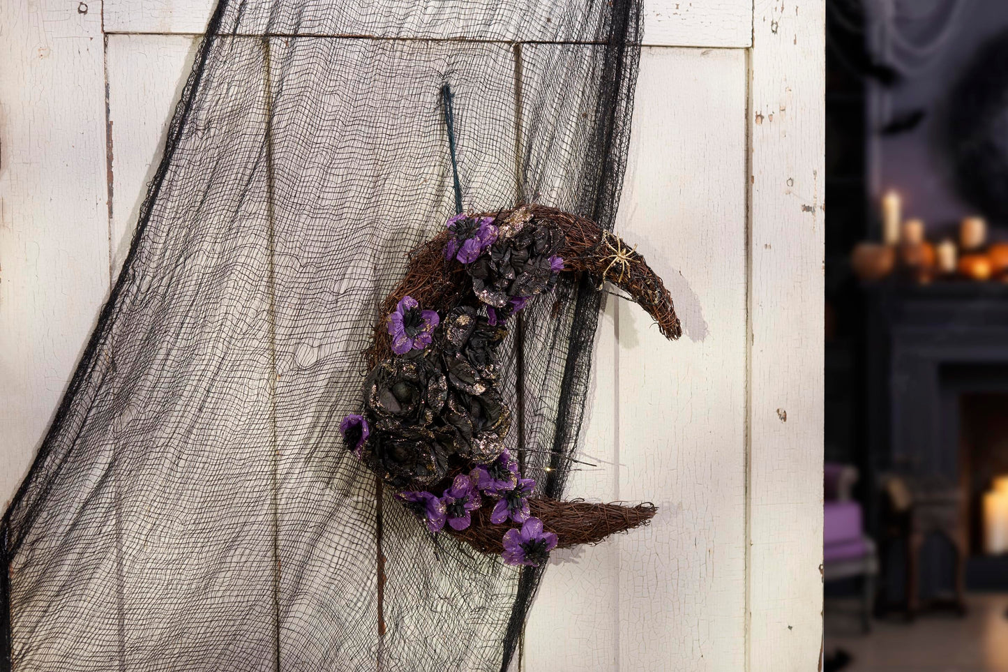 Primitives by Kathy Moody Moon Wreath - 14" x 17" Seasonal Halloween Decor, Rattan Crescent with Black and Purple Faux Florals, Gold Glitter Details, and Gold Spider